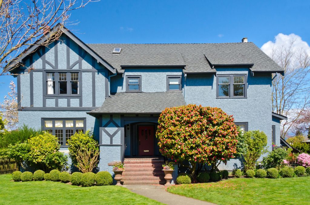 A blue home in Ross Township with a brand new roof and ridge vent